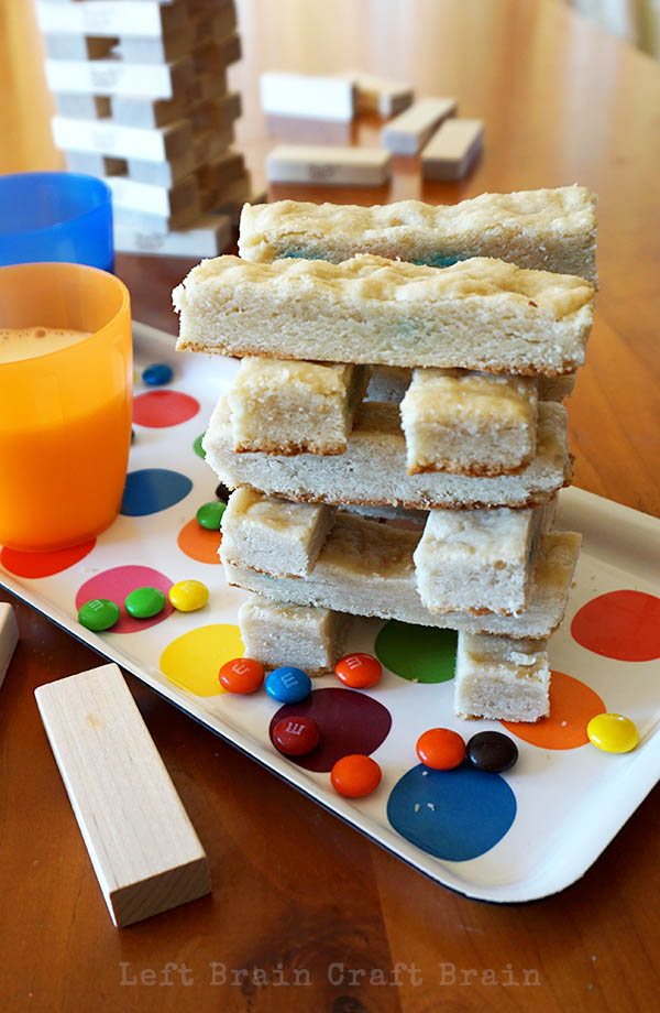 Make some M&M's® Surprise Cookie Bars for a fun Family Game Night snack. You can build with your game night cookies! #GameNightIn #Ad