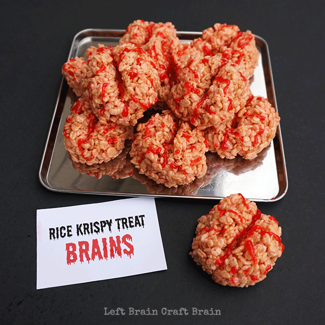 Totally delicious, totally creepy Rice Crispy Treat Brainsare perfect for your Halloween or Mad Scientist get togethers.