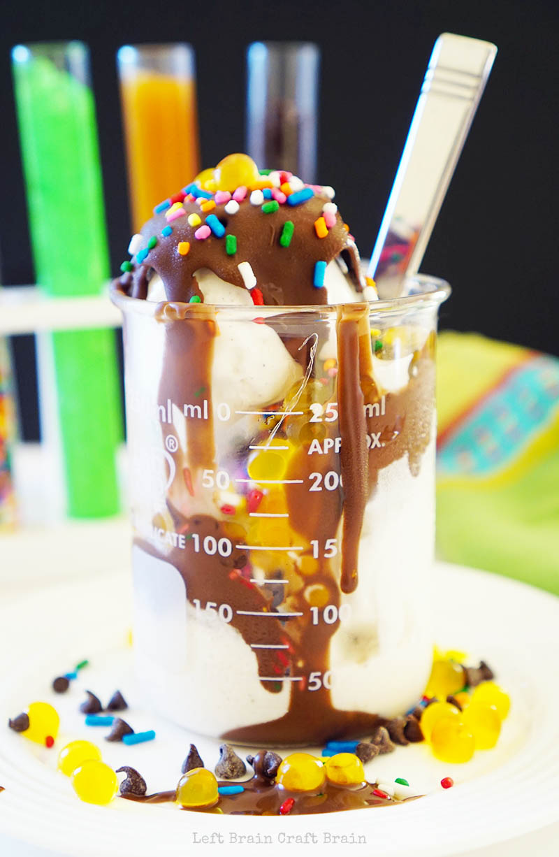 ice cream sundae with popping boba sprinkles and chocolate shell in beaker