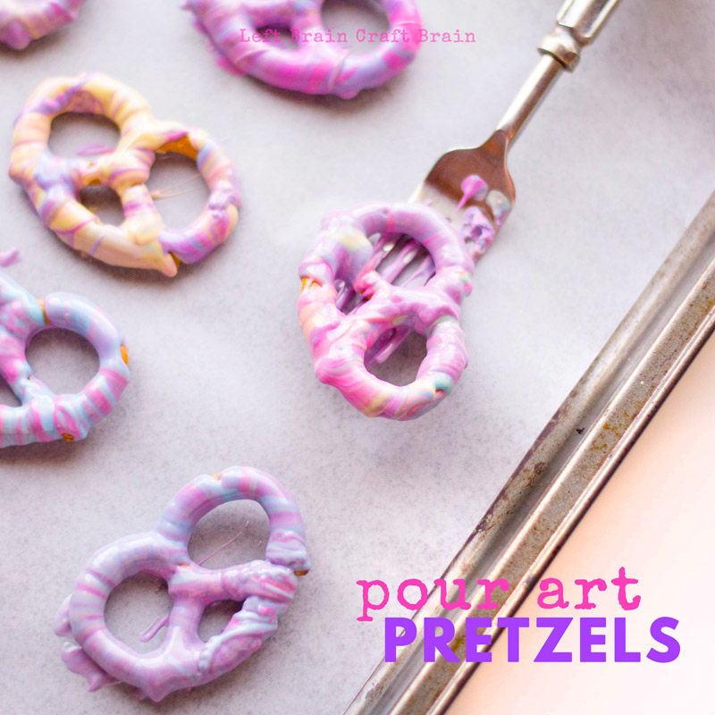 These colorful pour art white chocolate covered pretzels are a beautiful addition to any cookie tray. Perfect for Christmas, unicorn birthday parties, or any special occasion. Candy melts make them easy.