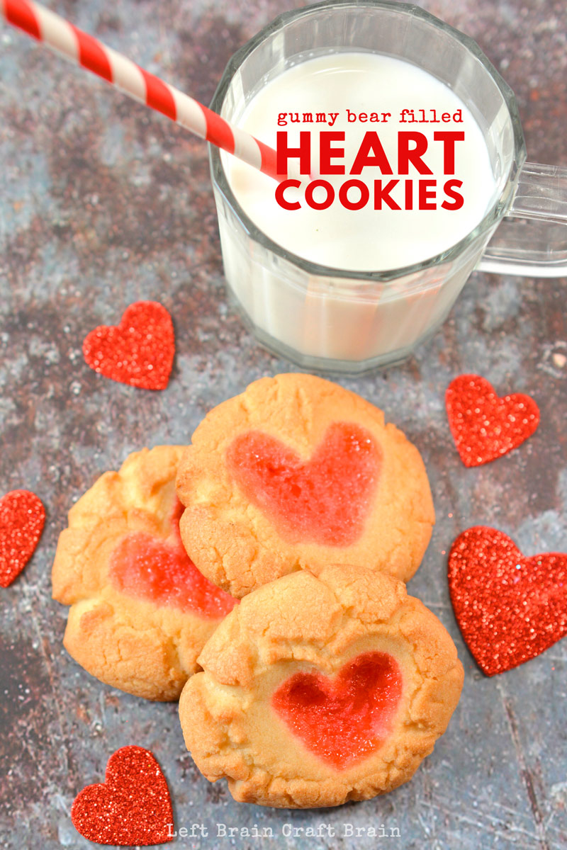 A sweet gummy bear candy surprise gives these sugar heart cookies a flavorful, chewy bite. Super Easy Gummy Bear Filled Heart Cookies are perfect for Valentine’s Day, Christmas, or any day you’re gifting some homemade cookies to someone you love.
