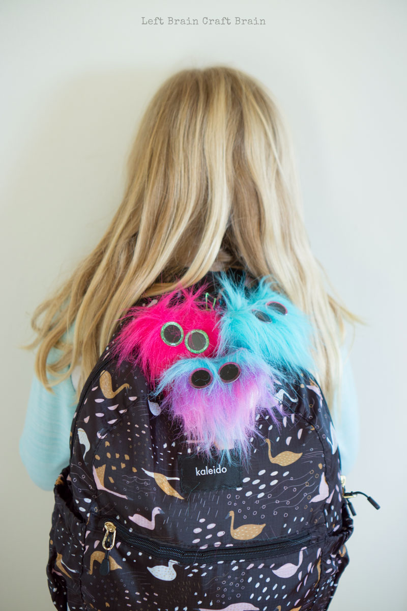 fuzzy heart backpack charms on backpack