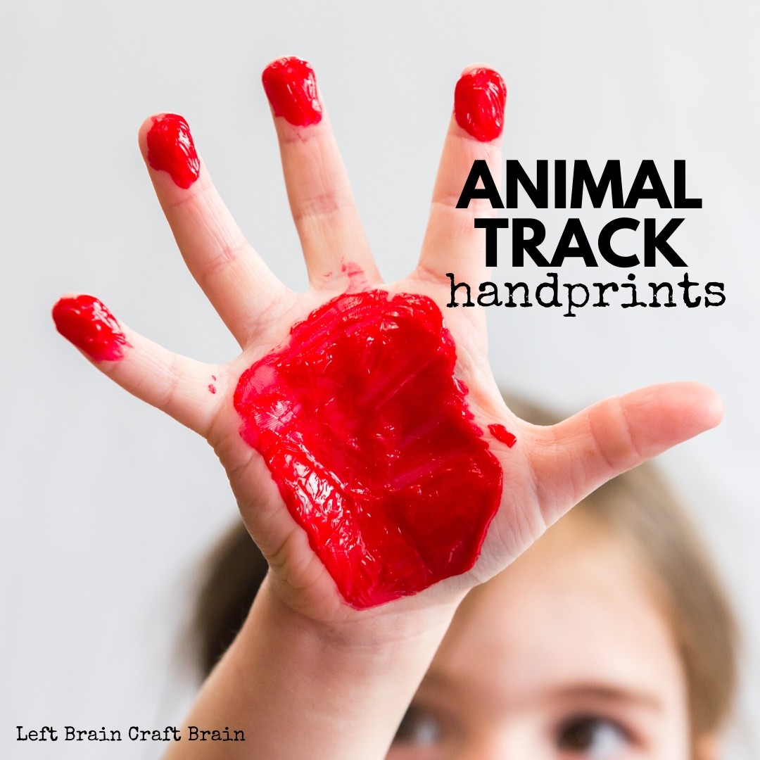 animal track handprints kid hand with red paint animal track on hand and fingers