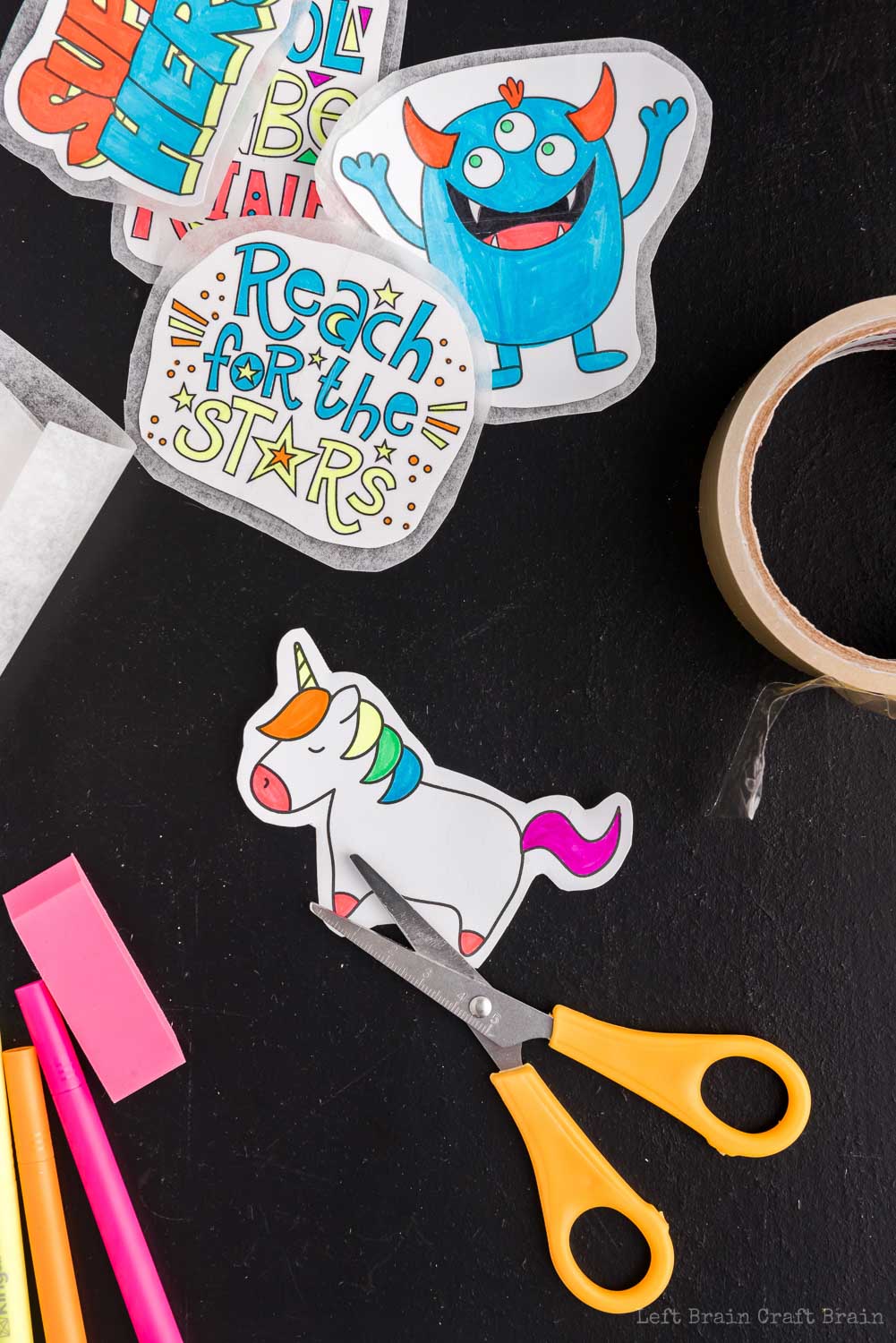 cut out the unicorn for the DIY stickers - Make your own DIY stickers with a super easy process using basic supplies. Kids will love this activity. They're fun to add to presents, too.